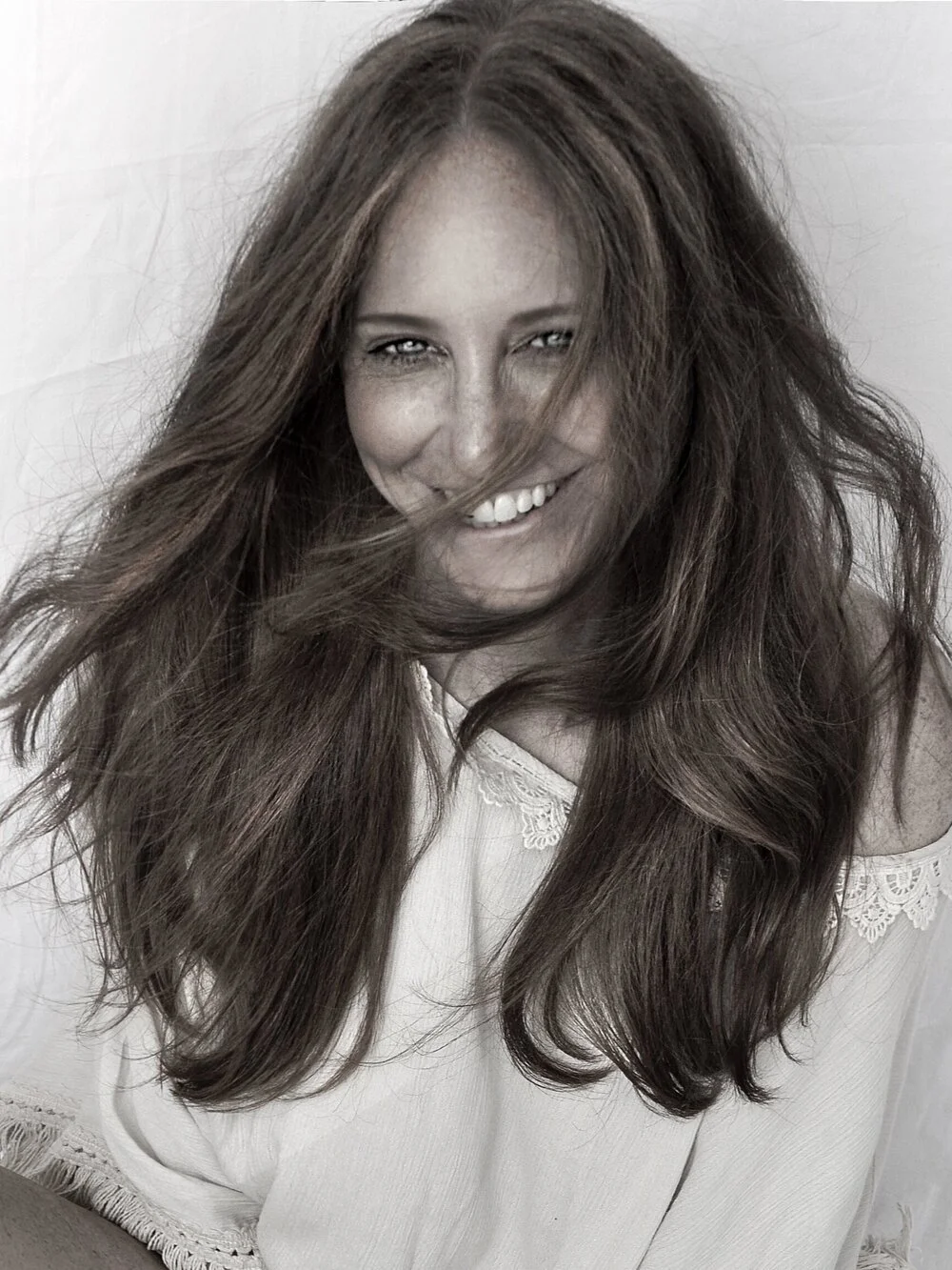 headshot of carrie in black and white