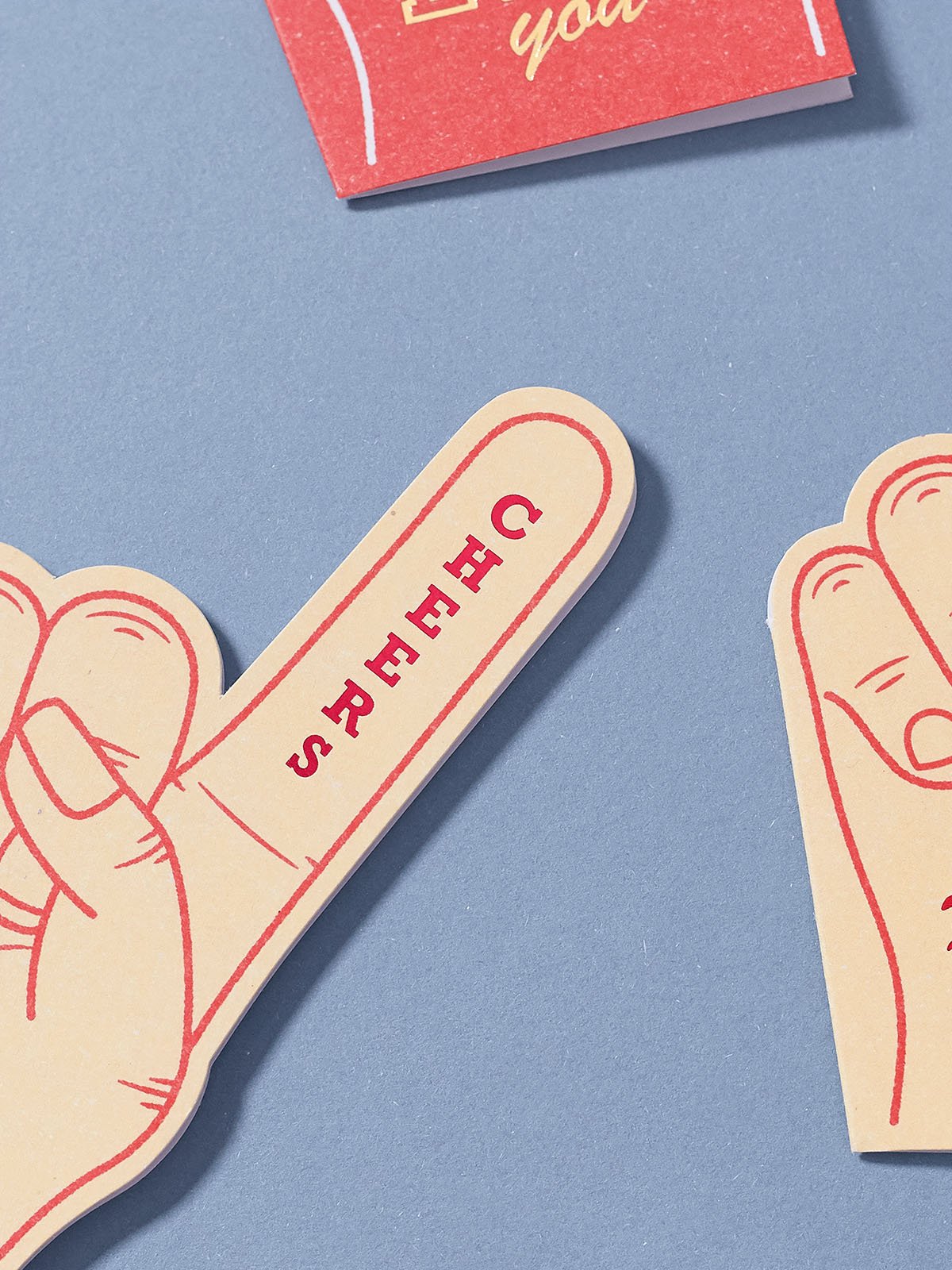 butter-yellow-foam-finger-greeting-card-with-hot-foil-cheers-close-up.jpg