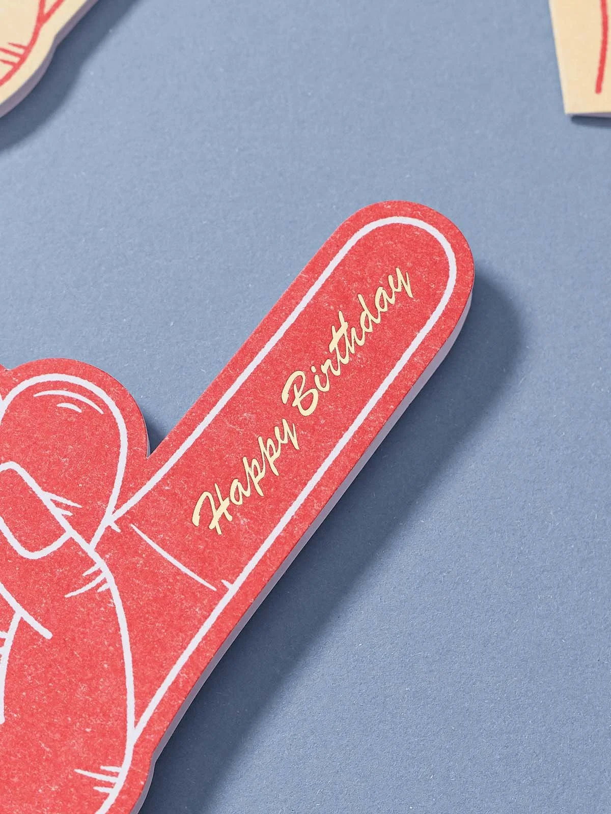 red-foam-finger-greeting-card-with-hot-foil-happy-birthday-close-up.jpg