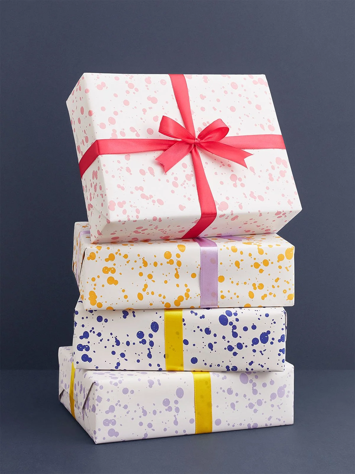 stack-of-presents-wrapped-in-splatterware-gift-wrap.jpg (Copy) (Copy) (Copy)