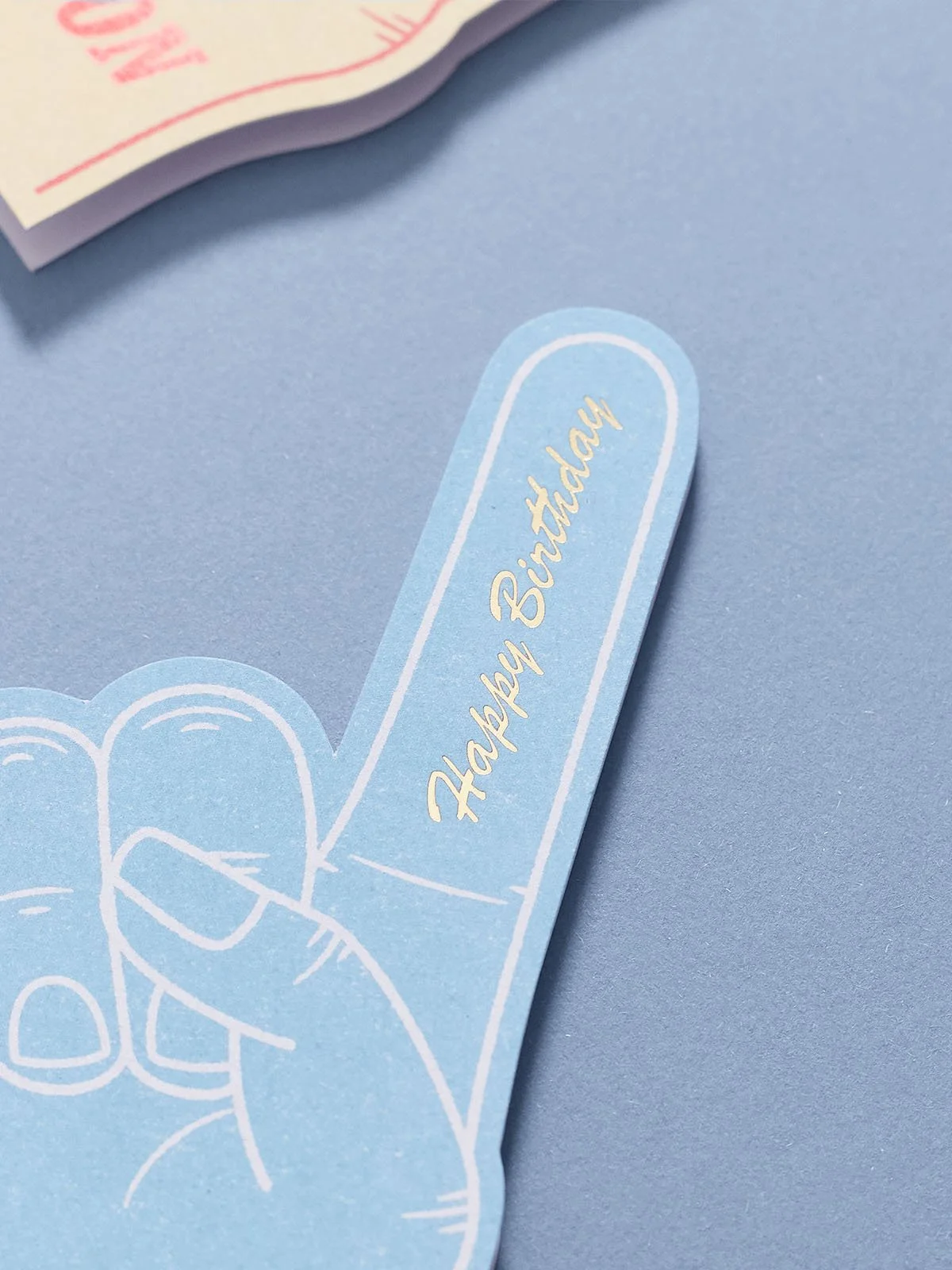 blue-foam-finger-greeting-card-with-hot-foil-happy-birthday-close-up.jpg