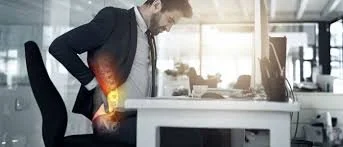 Learn practical physiotherapist-approved strategies to prevent lower back pain at work, including movement breaks, ergonomics, exercise and posture tips.