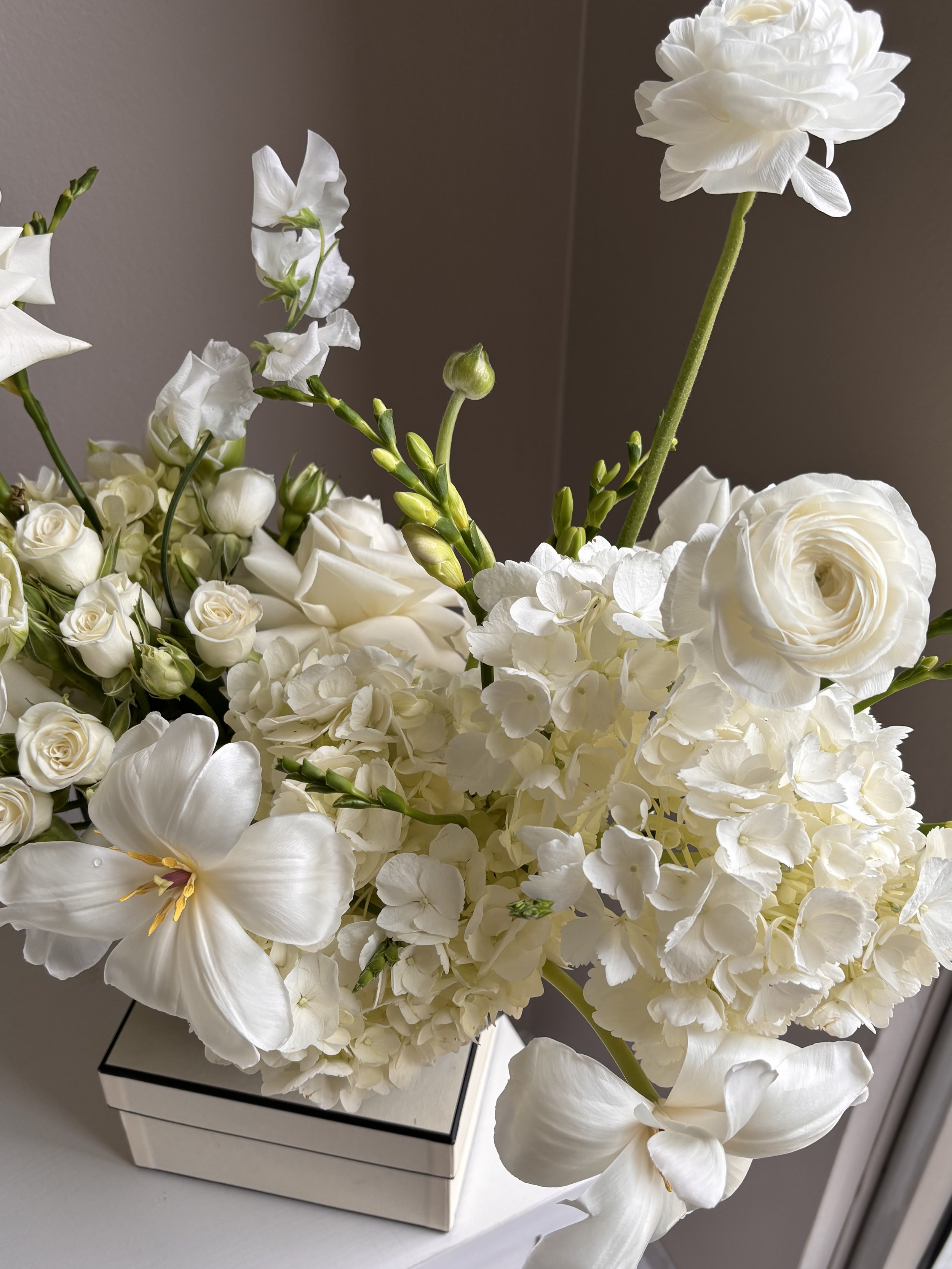 sympathy arrangement - hand-selected seasonal blooms arranged in a keepsake vase. A thoughtful tribute with local delivery in Northbrook IL.