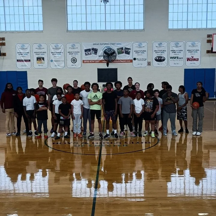 Chester Children Share Court with College Players at Basketball Clinic 