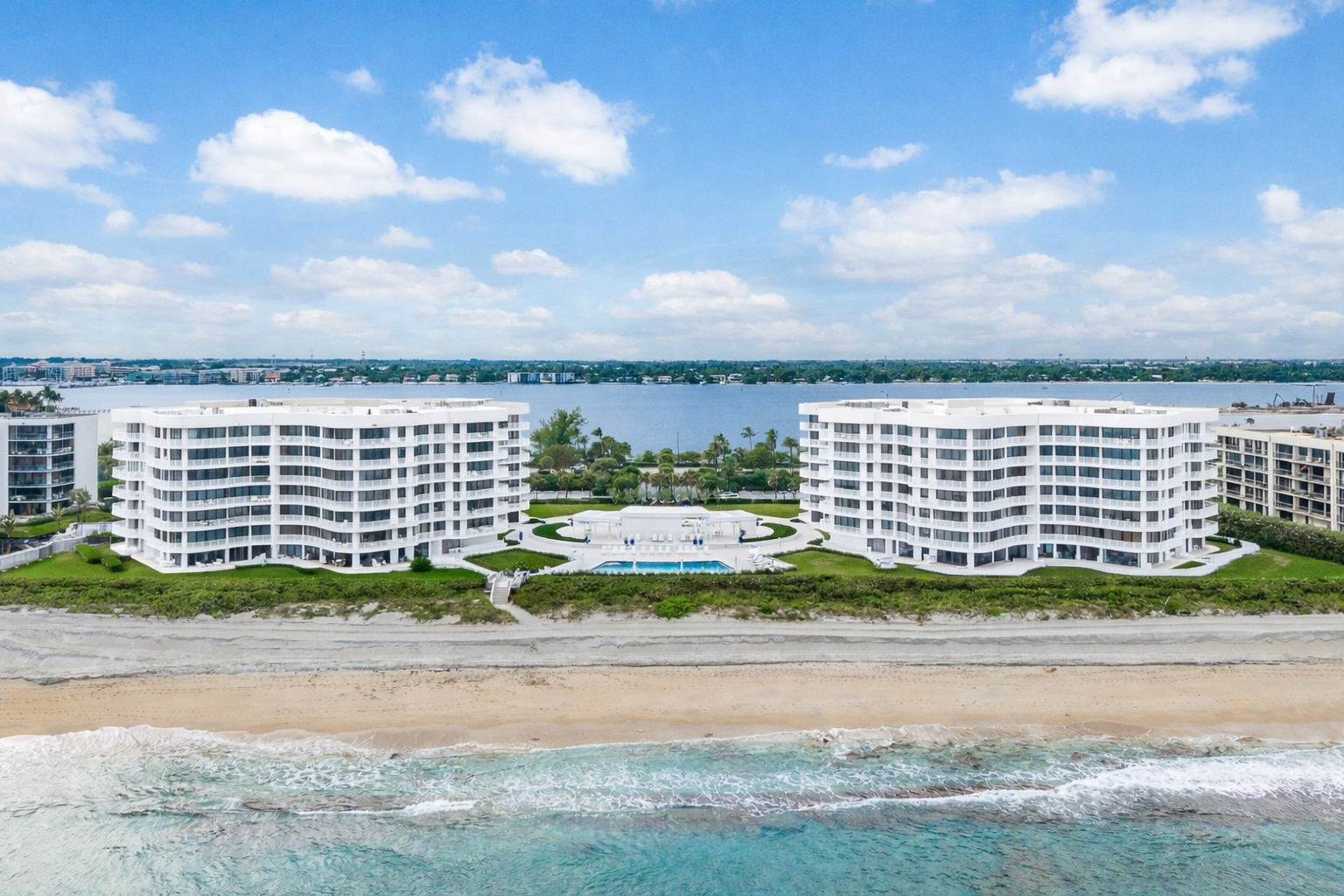 White Atriums Building Drone Shot.png