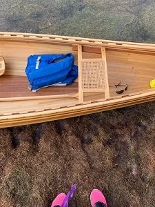 strip canoe lake side