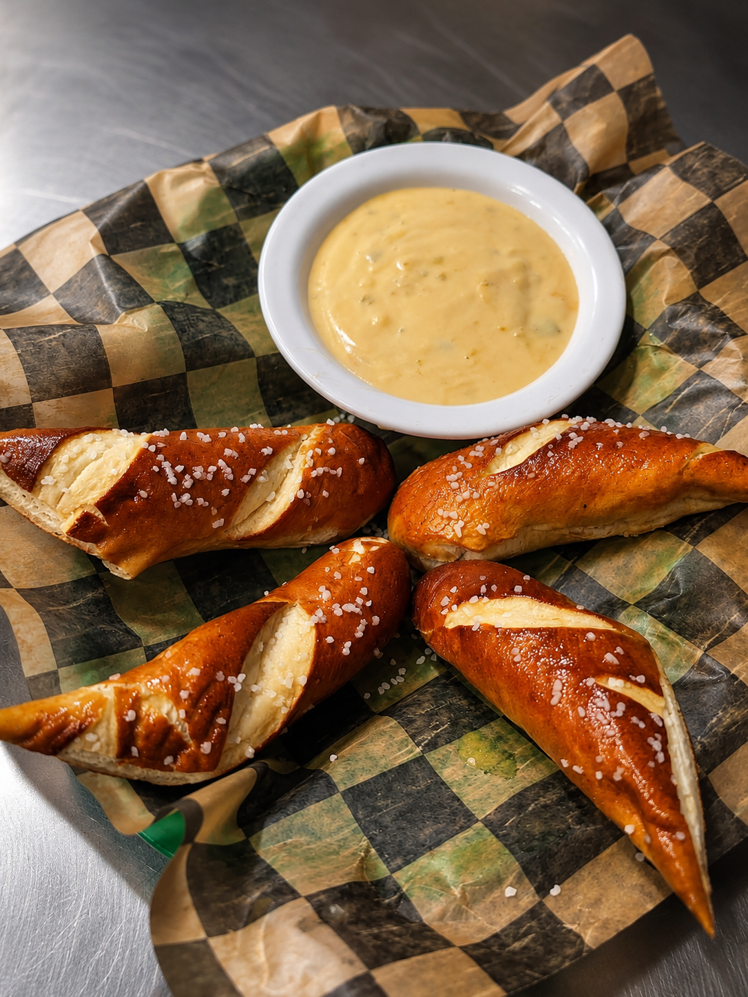 Cold drinks, great food, and live sports on 9 TVs at Stanley's Cup and Grill in Overland, MO.