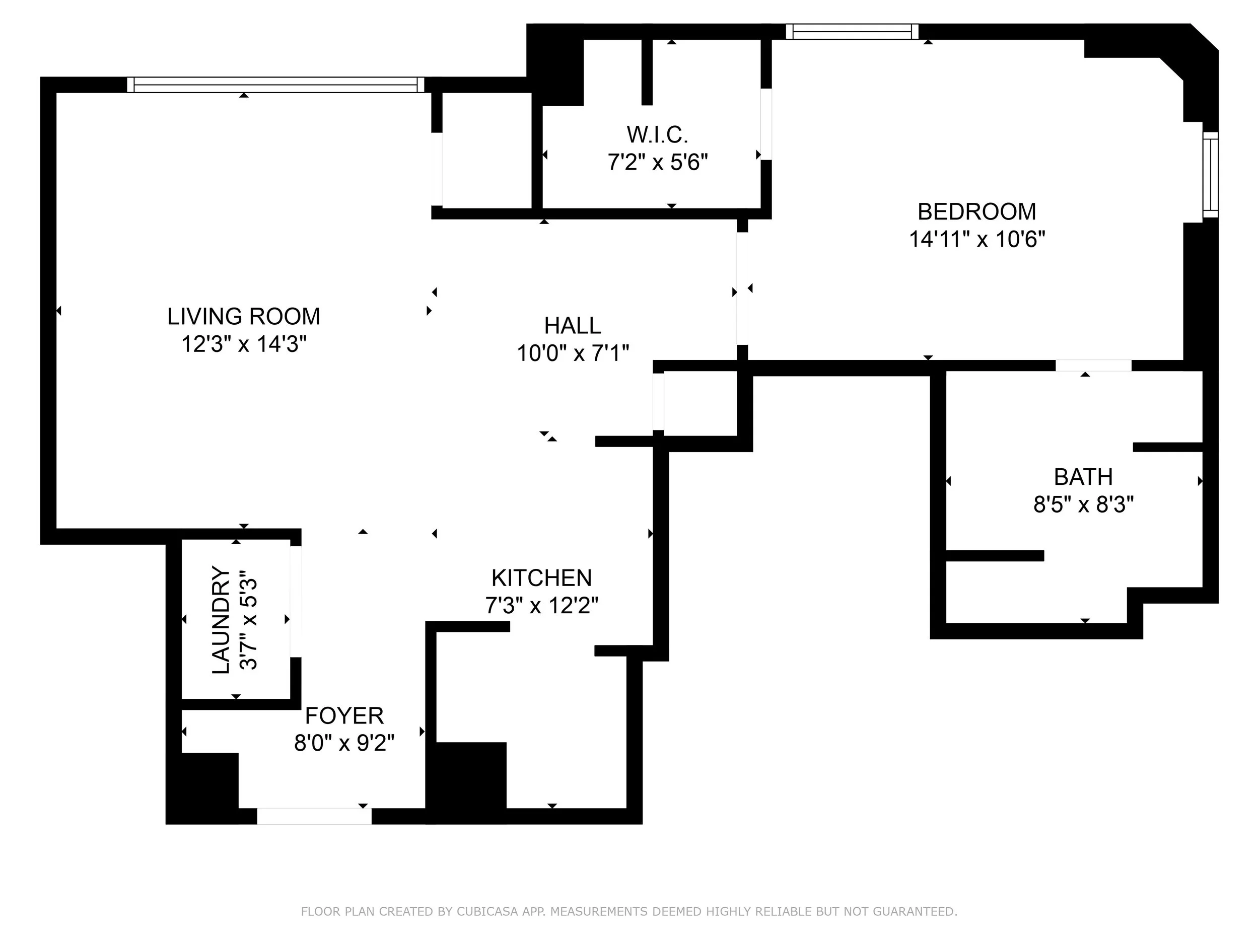 Floor plan of an apartment showing a foyer, laundry, kitchen, hall, living room, bedroom, walk-in closet, and bathroom, with measurements.