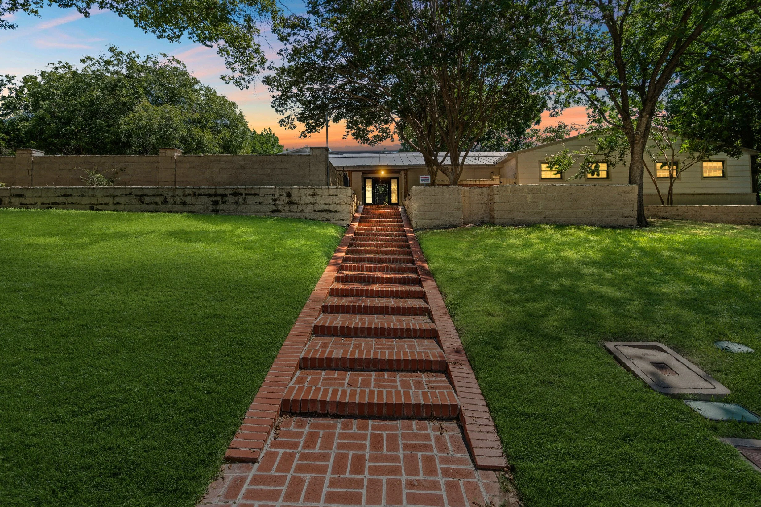Brightened twilight photo of front exterior.jpg