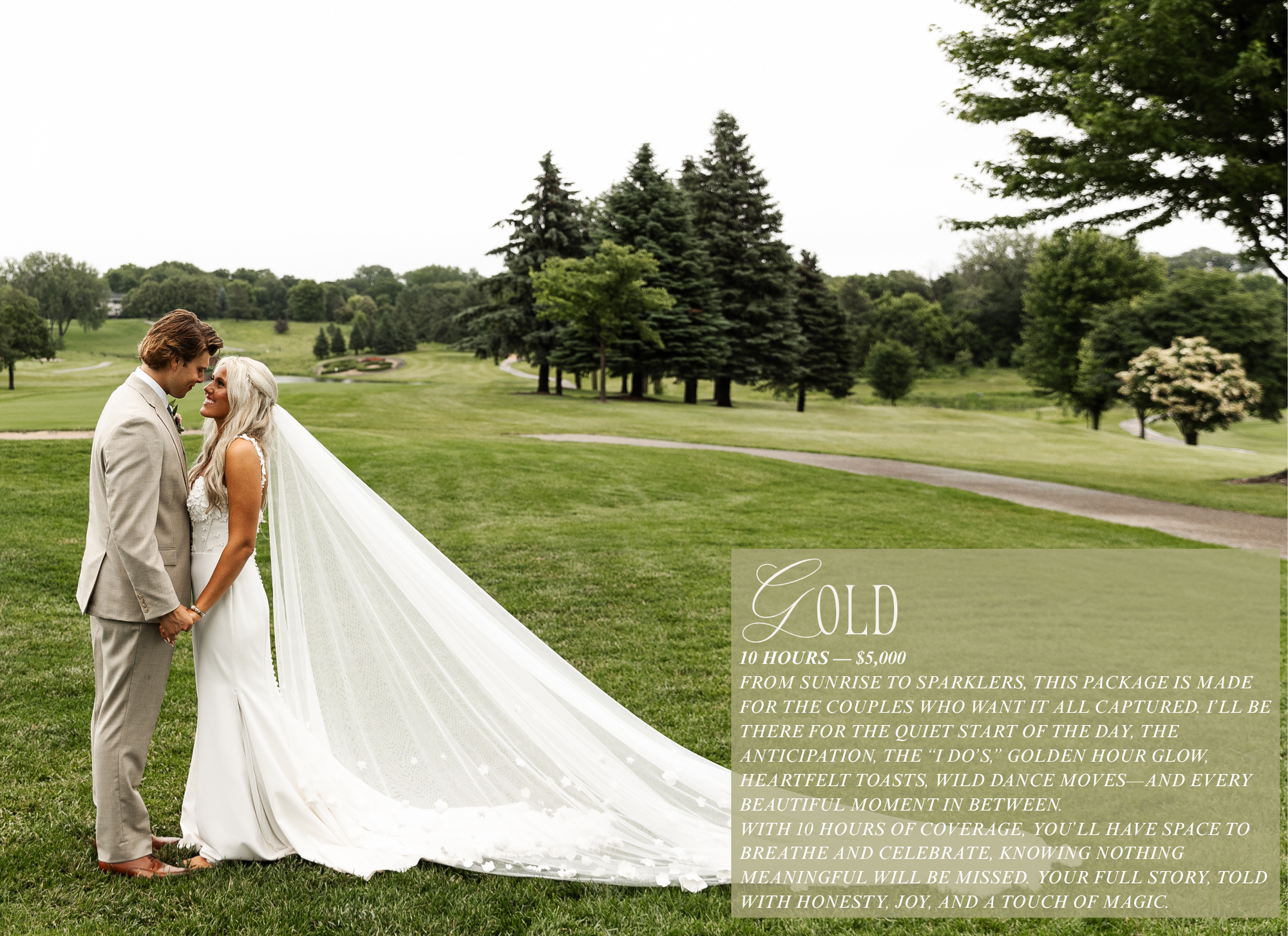 A bride and groom standing closely together on a grassy area in a park with trees in the background, the bride wearing a white wedding dress and long veil, holding hands, facing each other lovingly.