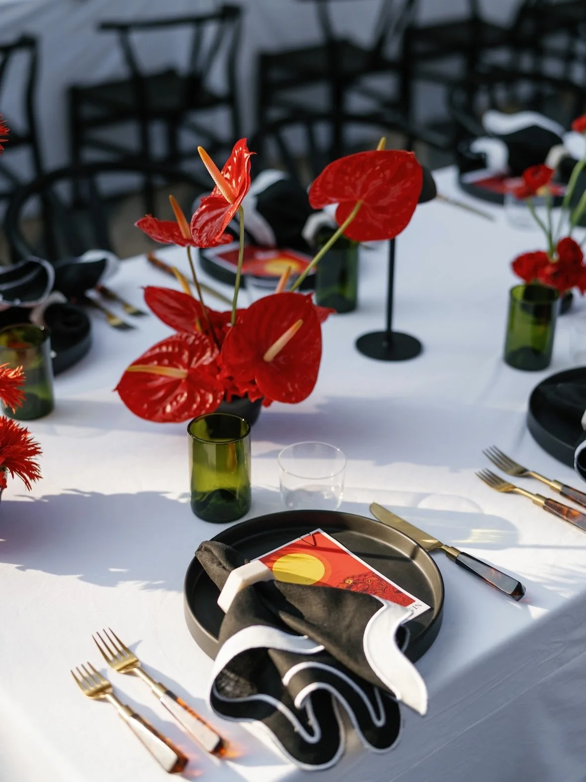 A rehearsal dinner that set the tone. Hosted at Hotel Saint Cecilia, this event leaned fully into the venue&rsquo;s iconic red&mdash;pulling from its poster-style logo, bold accents, and moody palette to create a space that felt graphic, layered, and