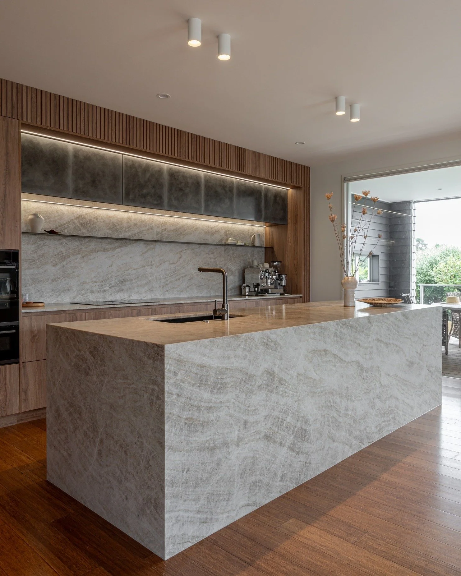 A kitchen designed for both function and beauty - exactly what our client wanted. 
This marble island anchors the space, surrounded by warm timber floors and soft natural light. Every surface, join and junction reflects the precision and craftsmanshi