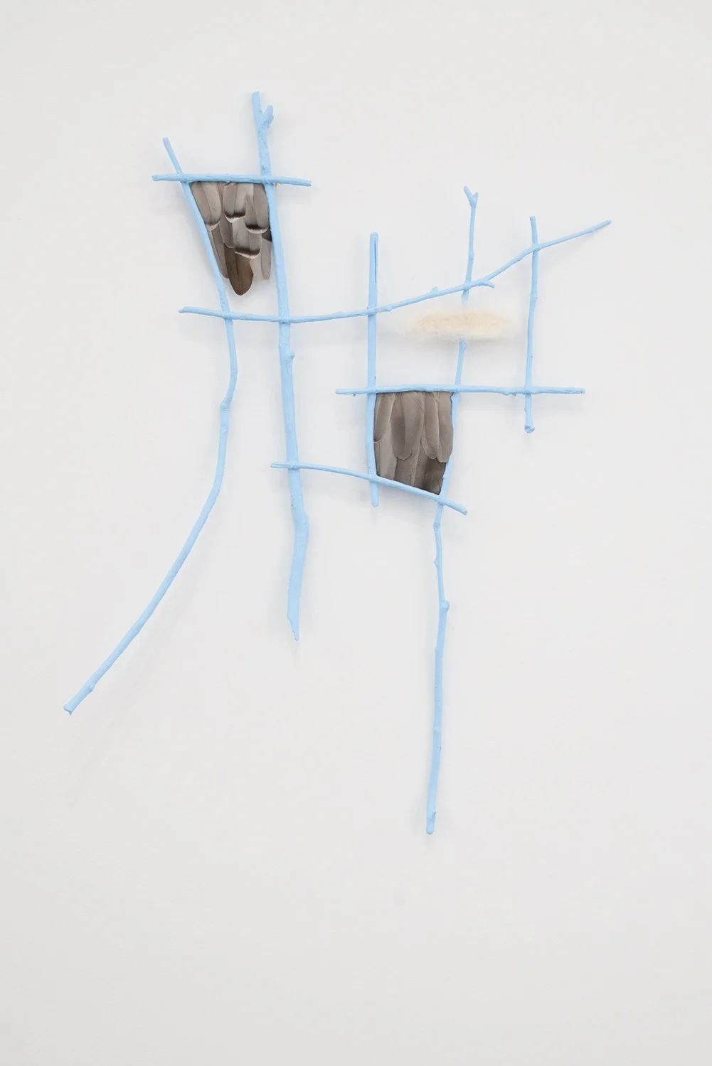 Capucine_Bourcart_THE PIGEONS WERE HERE_2025_Branches, acrylic paint, pigeons feathers, wool_29.5x21x2.25 IN.jpg