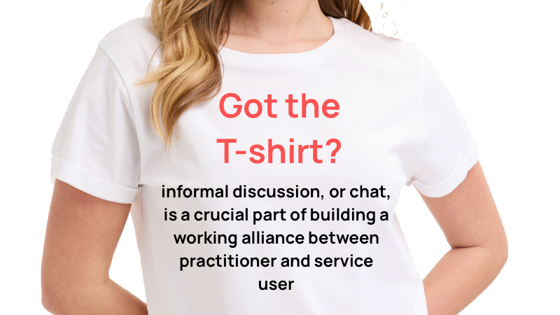 Close-up of a woman wearing a white T-shirt with red and black text about the importance of informal discussion and chat between practitioners and service users.