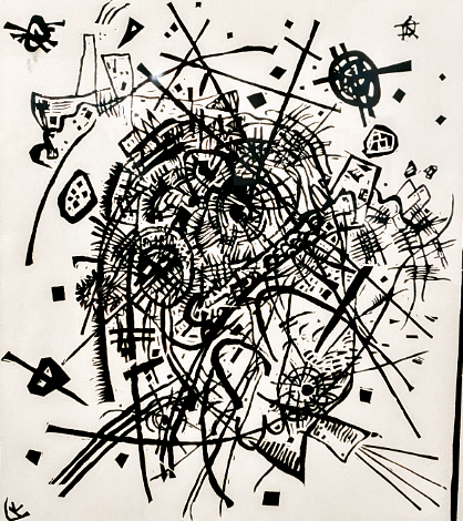 Sunset over a river with colorful clouds and reflective water on a sandy beach.