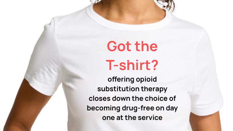 White T-shirt with red and black text promoting opioid substitution therapy as a way to become drug-free.