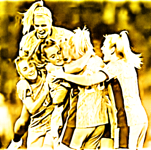 Multiple white and black seabirds, including adult and fledgling gannets, resting on rocks near water.