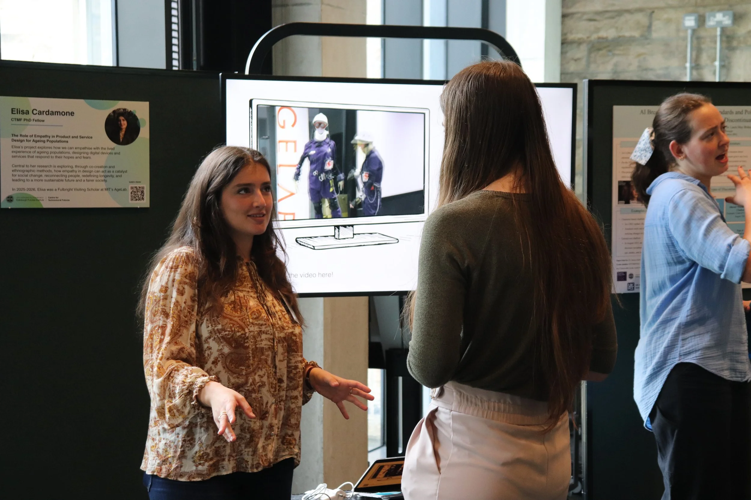 Elisa Cardamone explaining her research on display