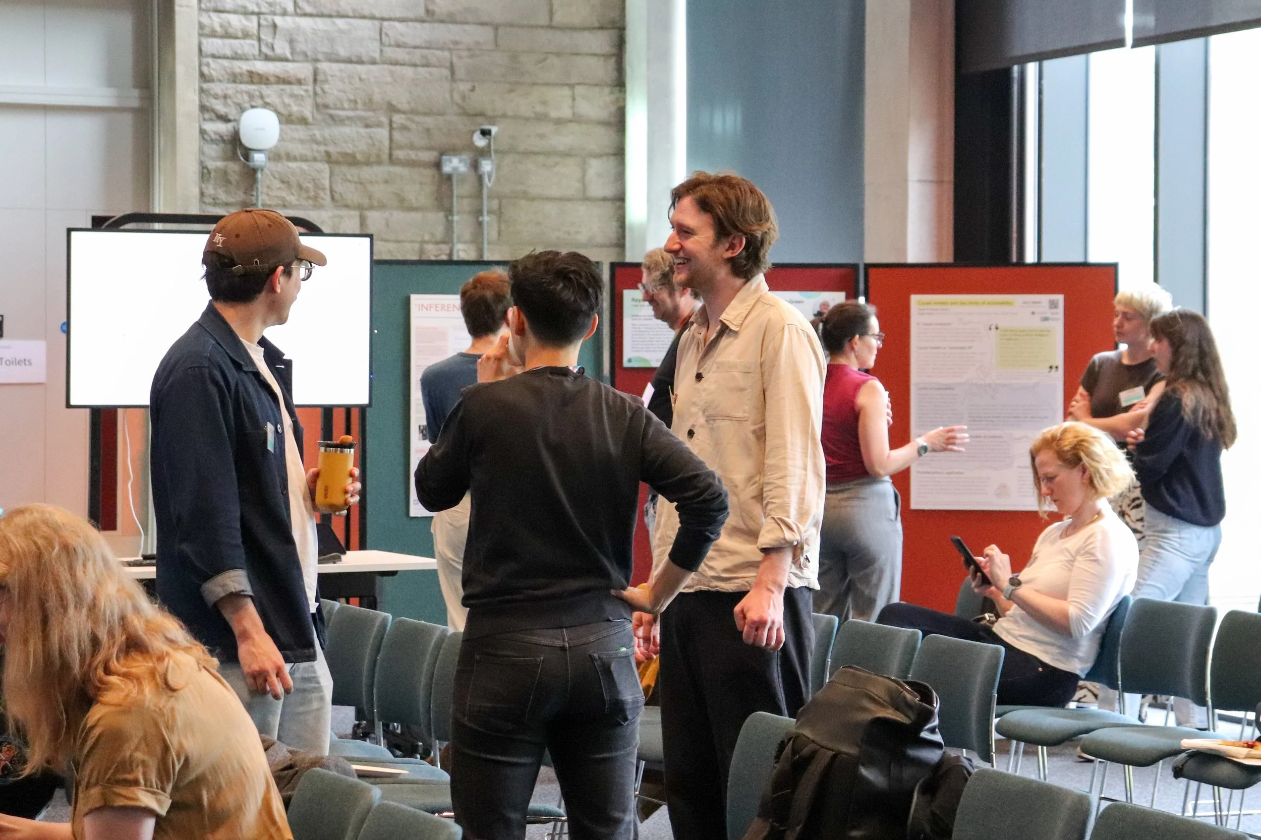 CTMF research community members smiling in conversation