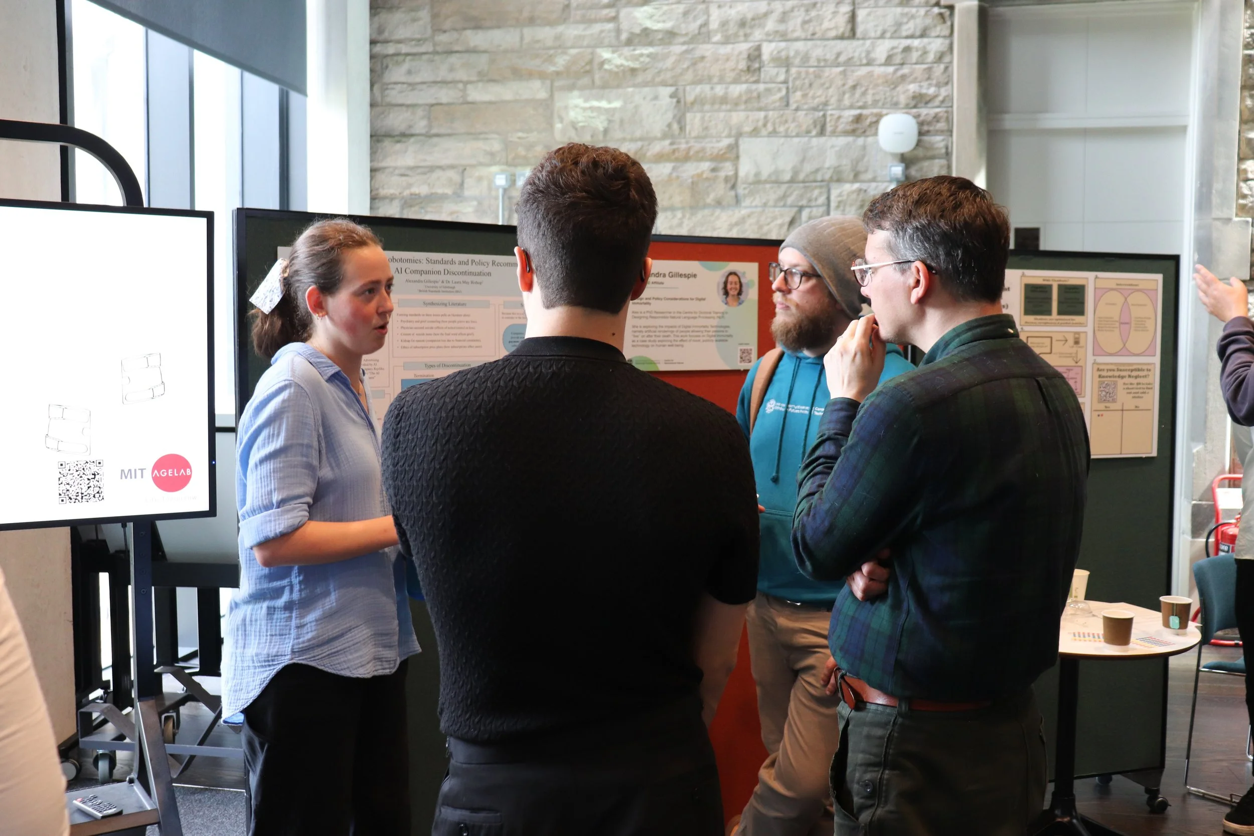 Alexandra Gillespie discussing her research poster