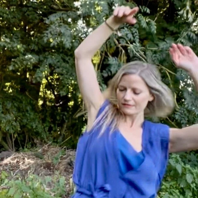 Maartje dancing in nature.