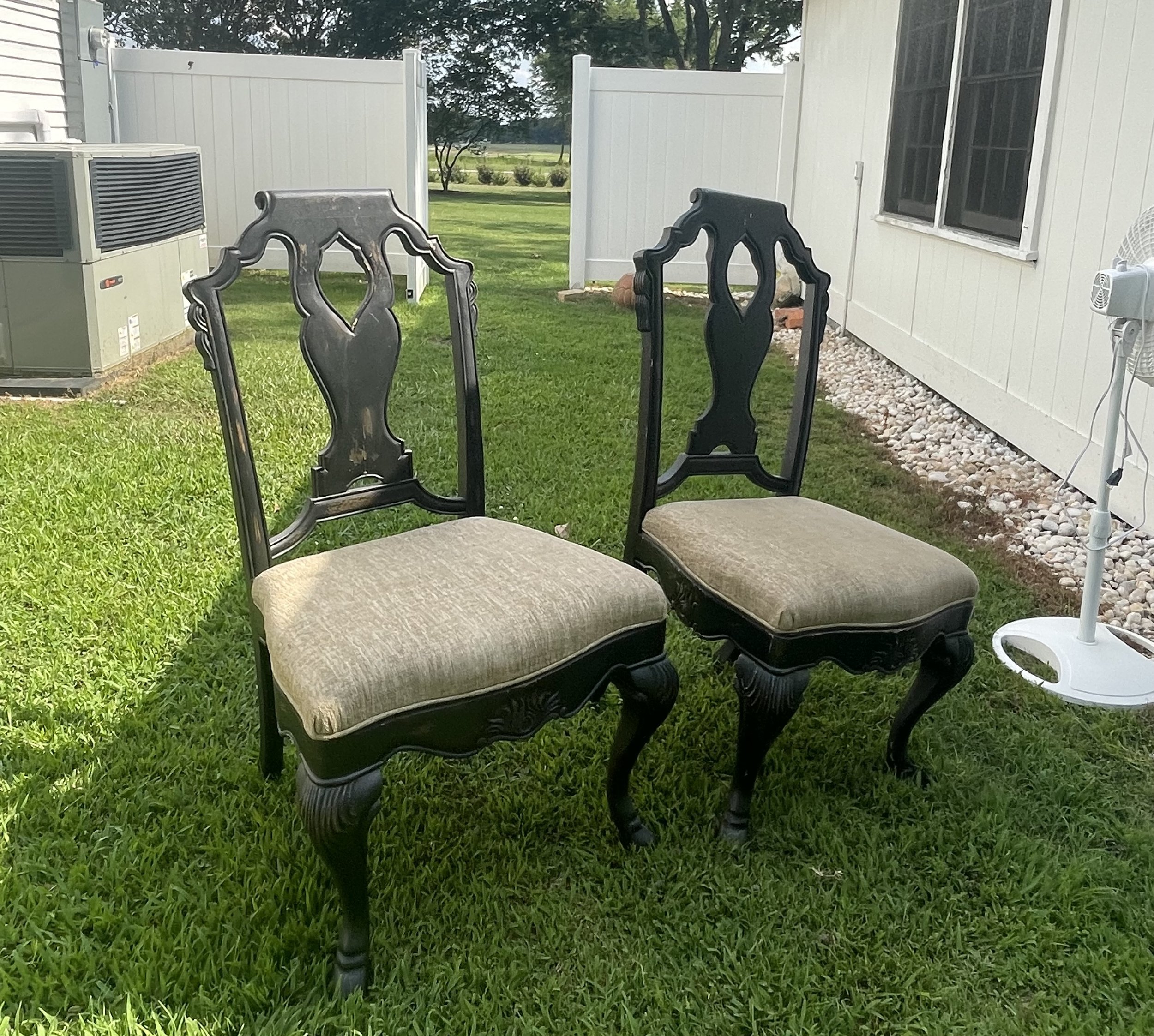 (2) large black chairs