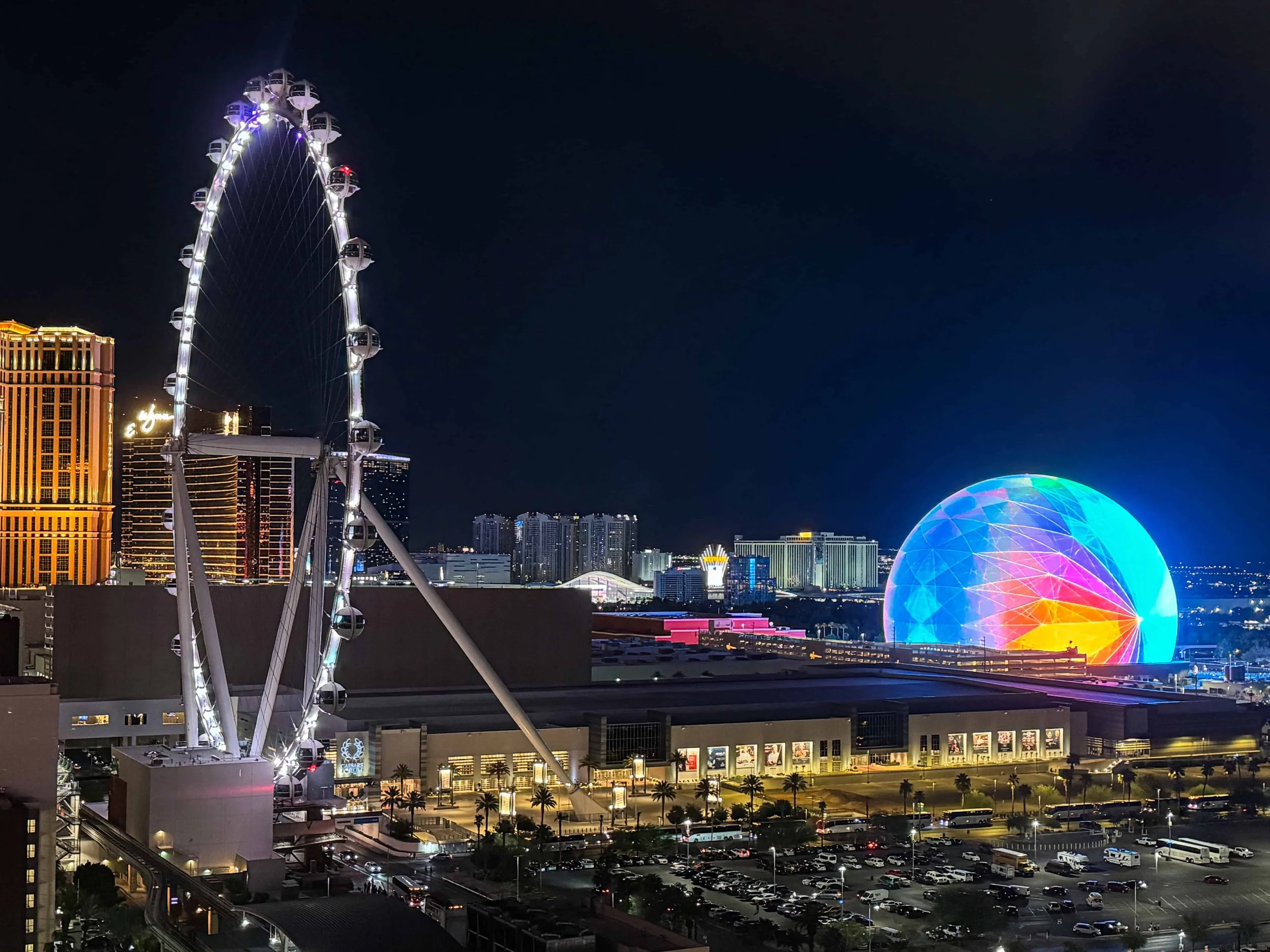 A nighttime view of the High Roller & the Sphere from our hotel room window at the Horseshoe Hotel & Casino.