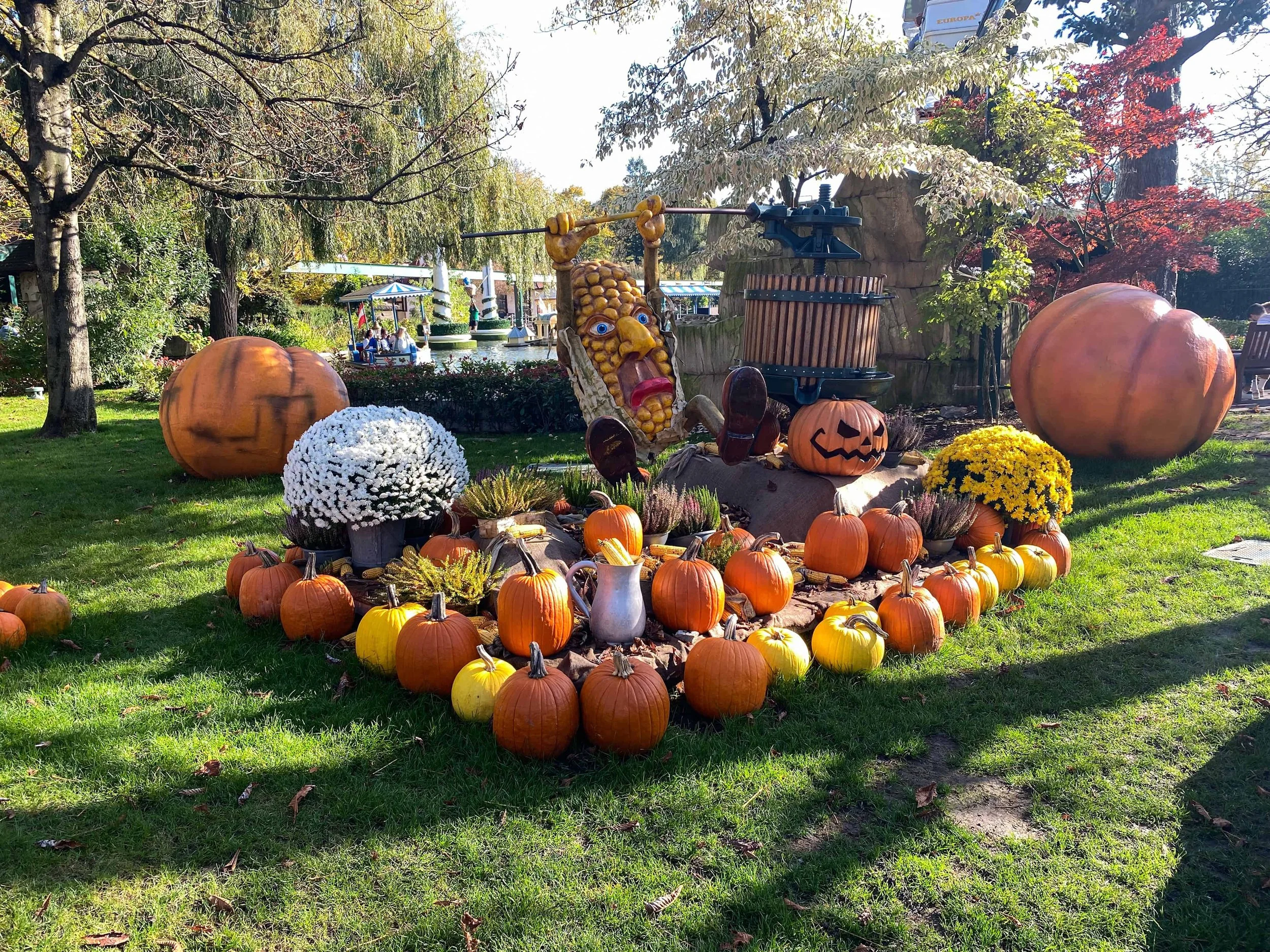 Giant pumpkins and fall decor at Europa-Park during the Halloween season.