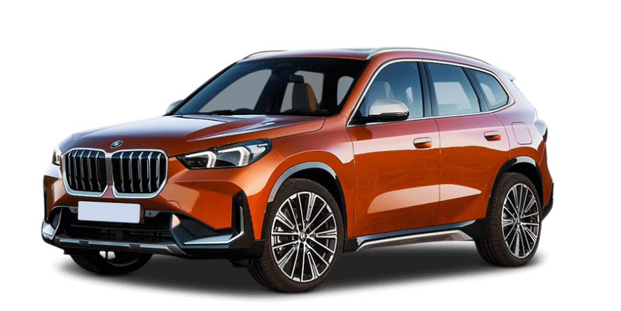 Orange compact SUV with modern design, large grille, LED headlights, and alloy wheels.
