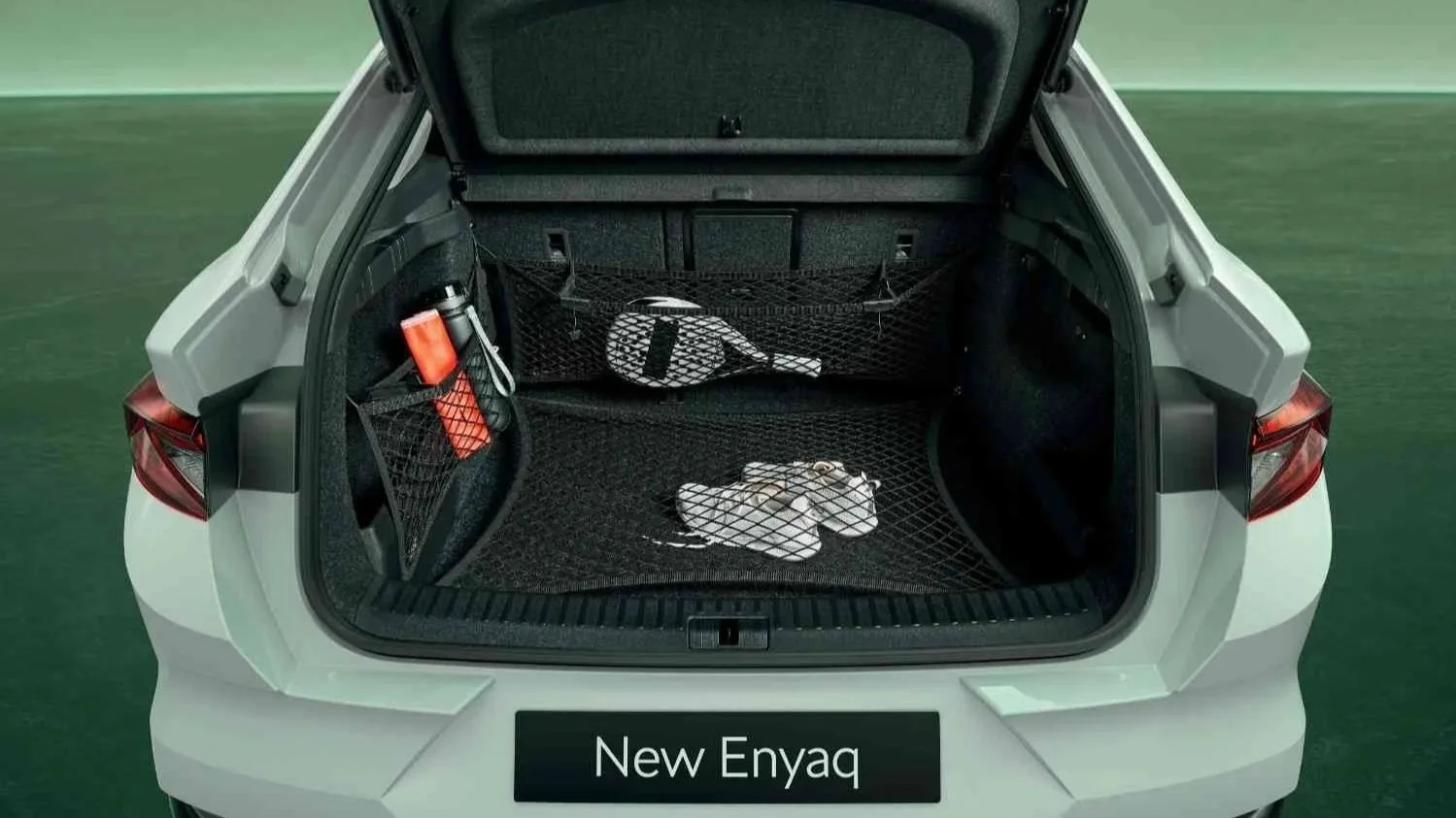 Skoda Enyaq Coupé image illustrating a modern EV profile often associated with practical boot and storage layout.