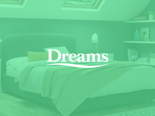 A bedroom with a bed and a window with a sloped ceiling. The word "Dreams" is written in the center.