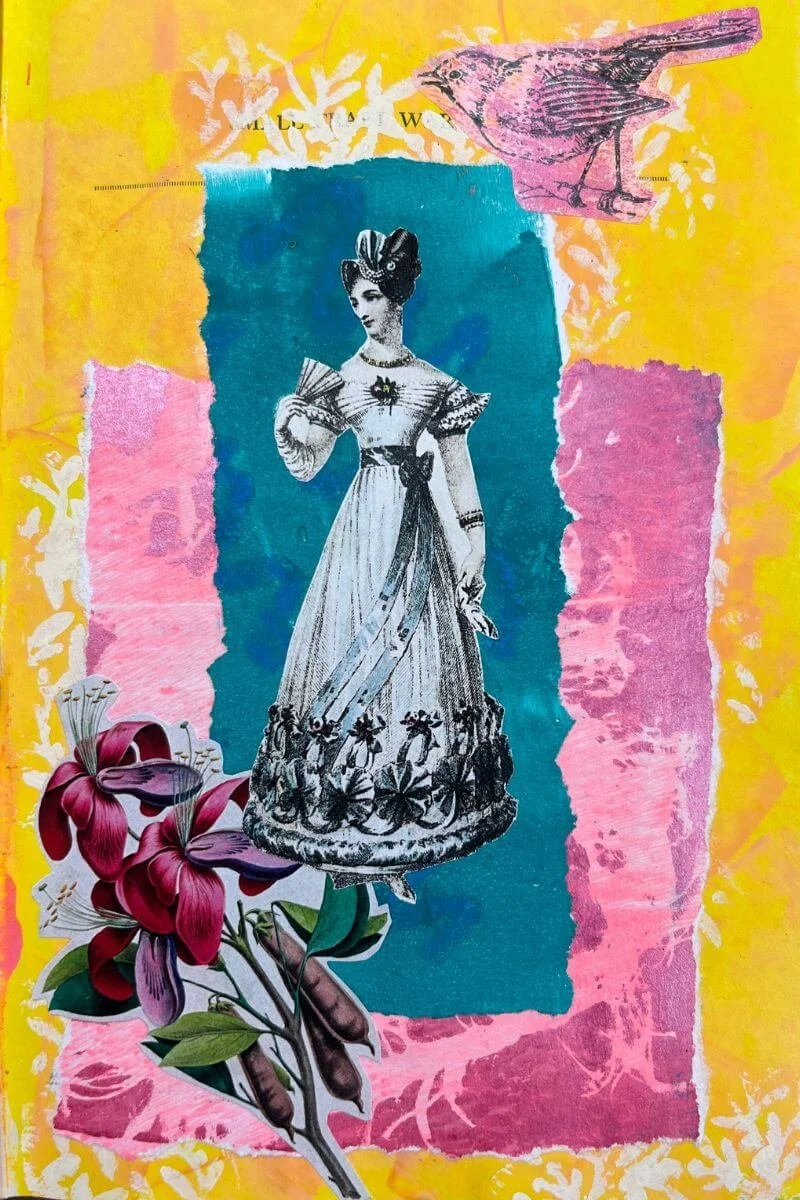 An art journal page using a vintage fashion plate as a focal point
