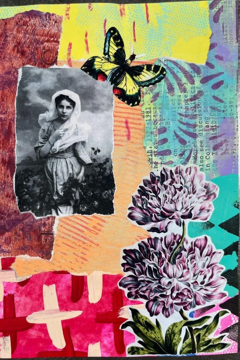 A colorful art journal page with a vintage photo, butterfly, and flower as focal points
