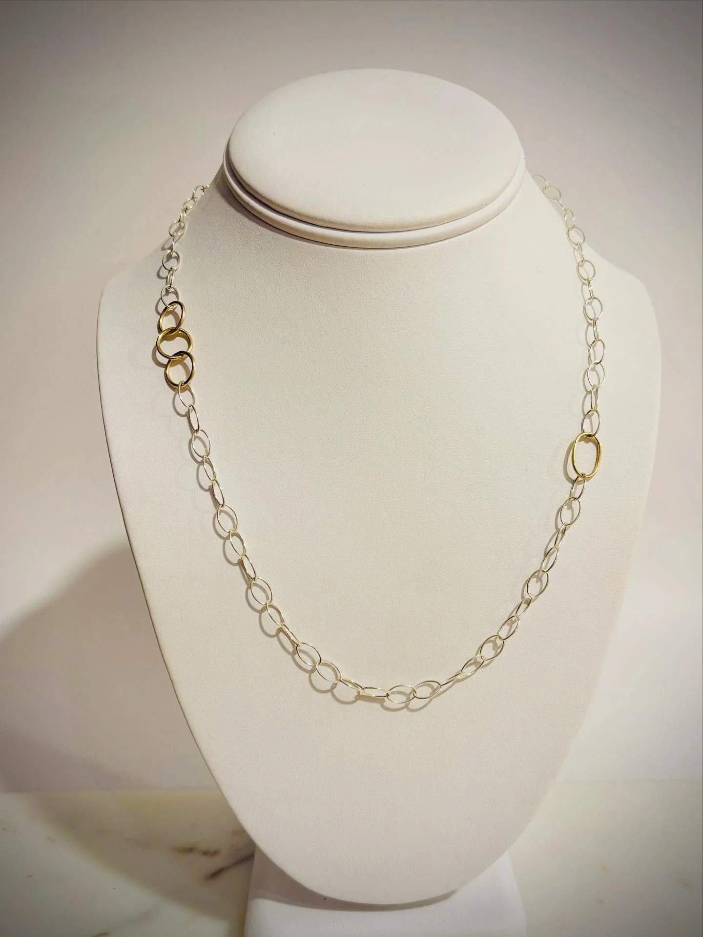Gave this classic silver oval chain a fresh update by adding handcrafted 14k gold circles. I love how the mix of metals adds a modern touch while keeping it simple and timeless. Easy to wear alone or layered &mdash; just the right hint of gold and gl
