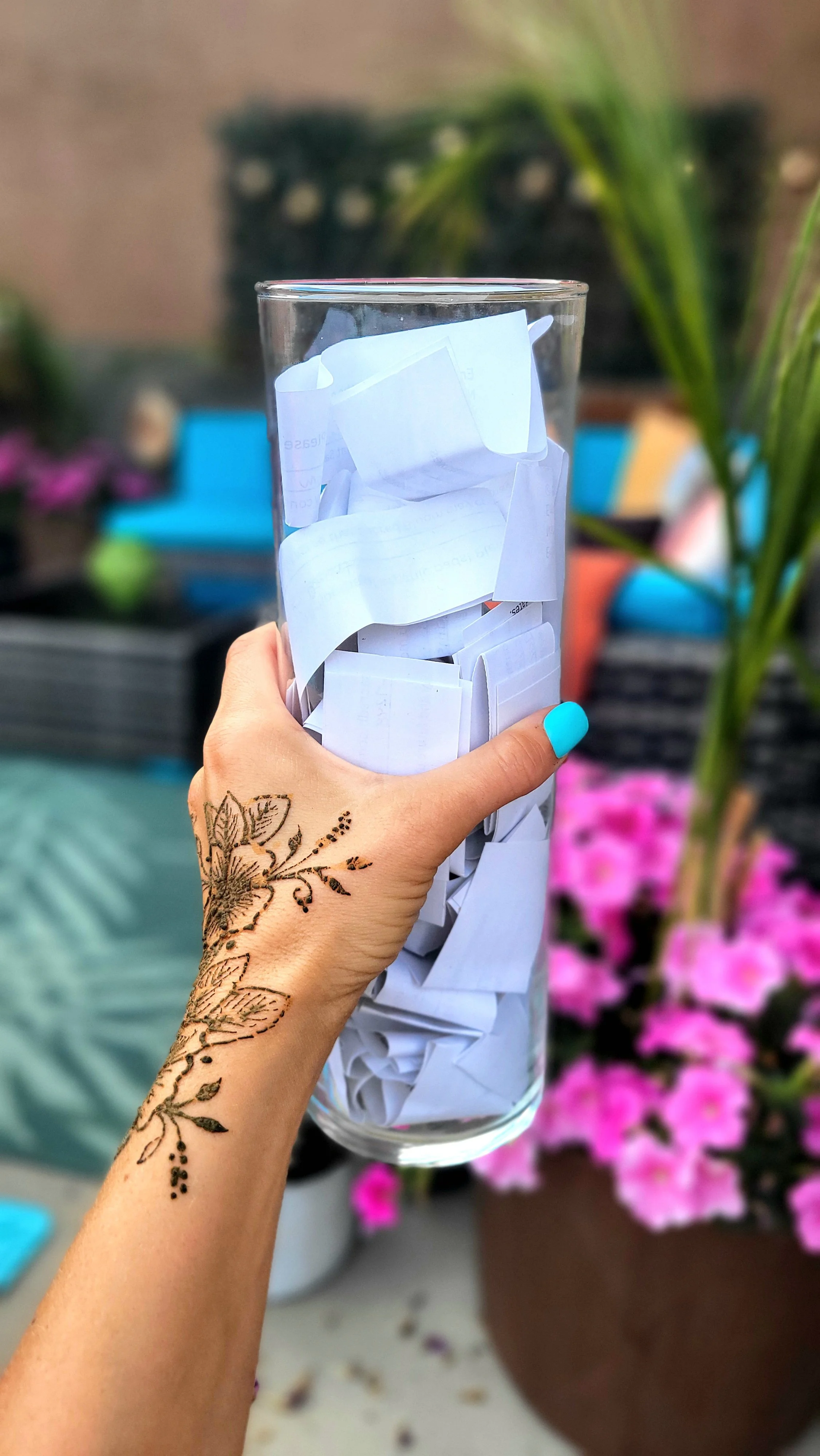 Sacred Bloom Giveaway Prize of hand holding raffle prize jar in Calgary Alberta