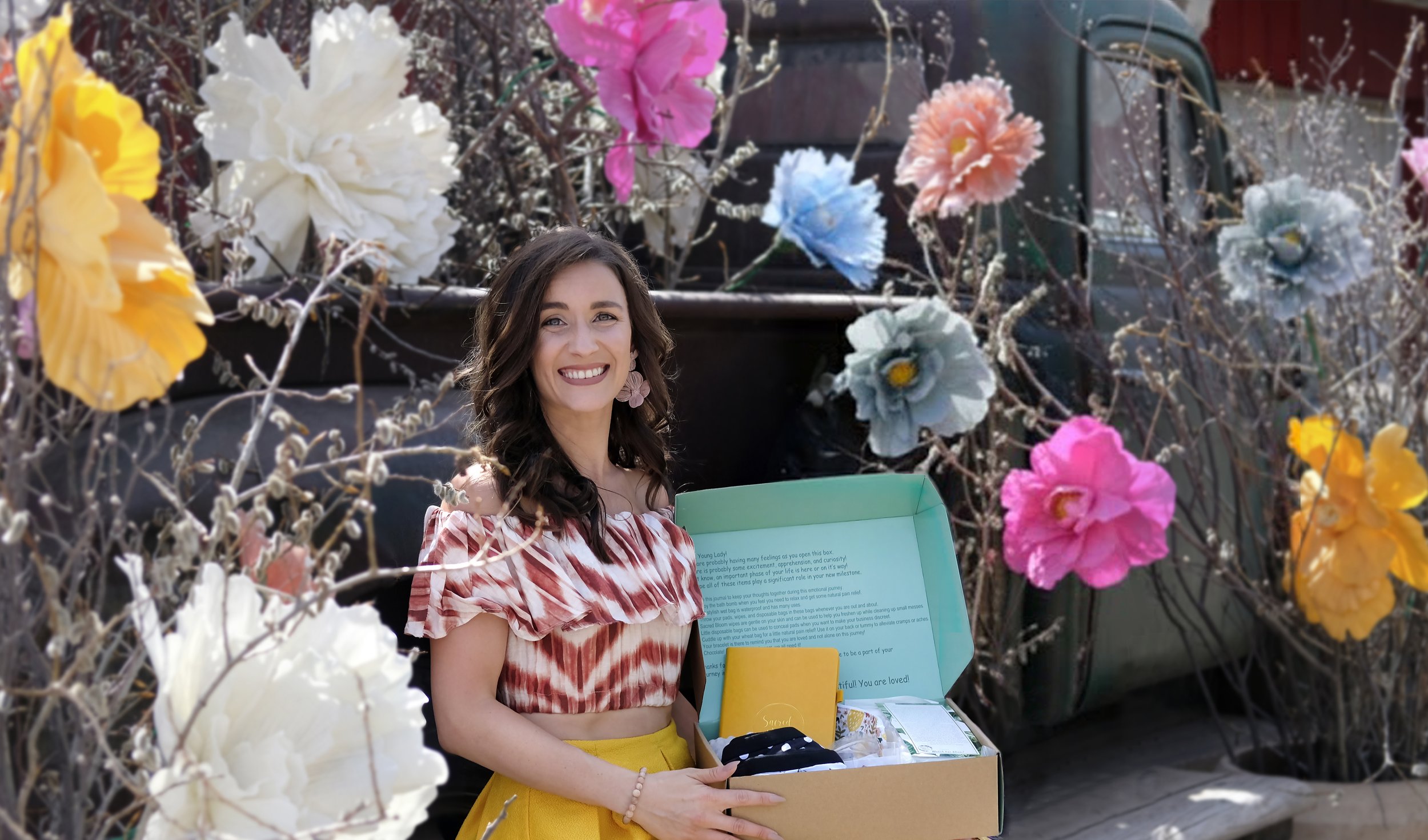 Owner Rachel holding a First Period Box of Sacred Bloom