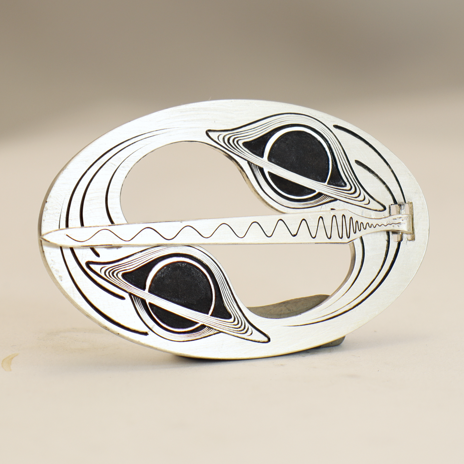 Gravity Brooch Square 1.png