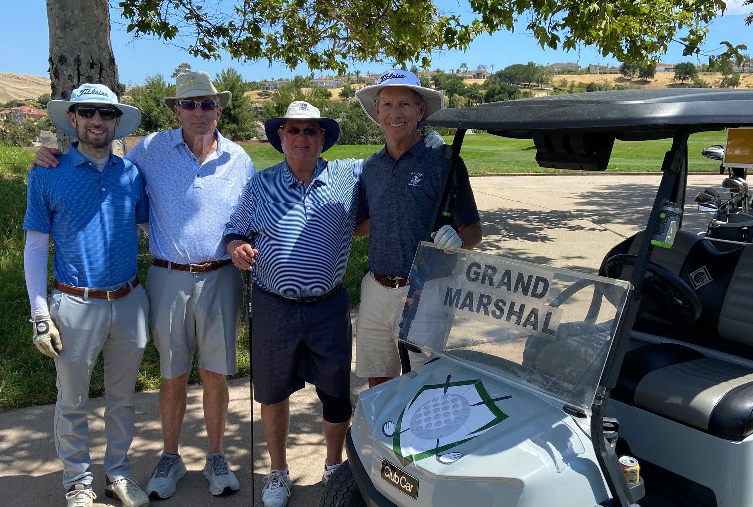   Mike, far right, is pictured with golf teammates Wade Meyercord, Joe Pfahnl and Chris Pope at the 39th Catholic Charities Invitational Golf Tournament on June 12 at Silver Creek Valley Country Club.  