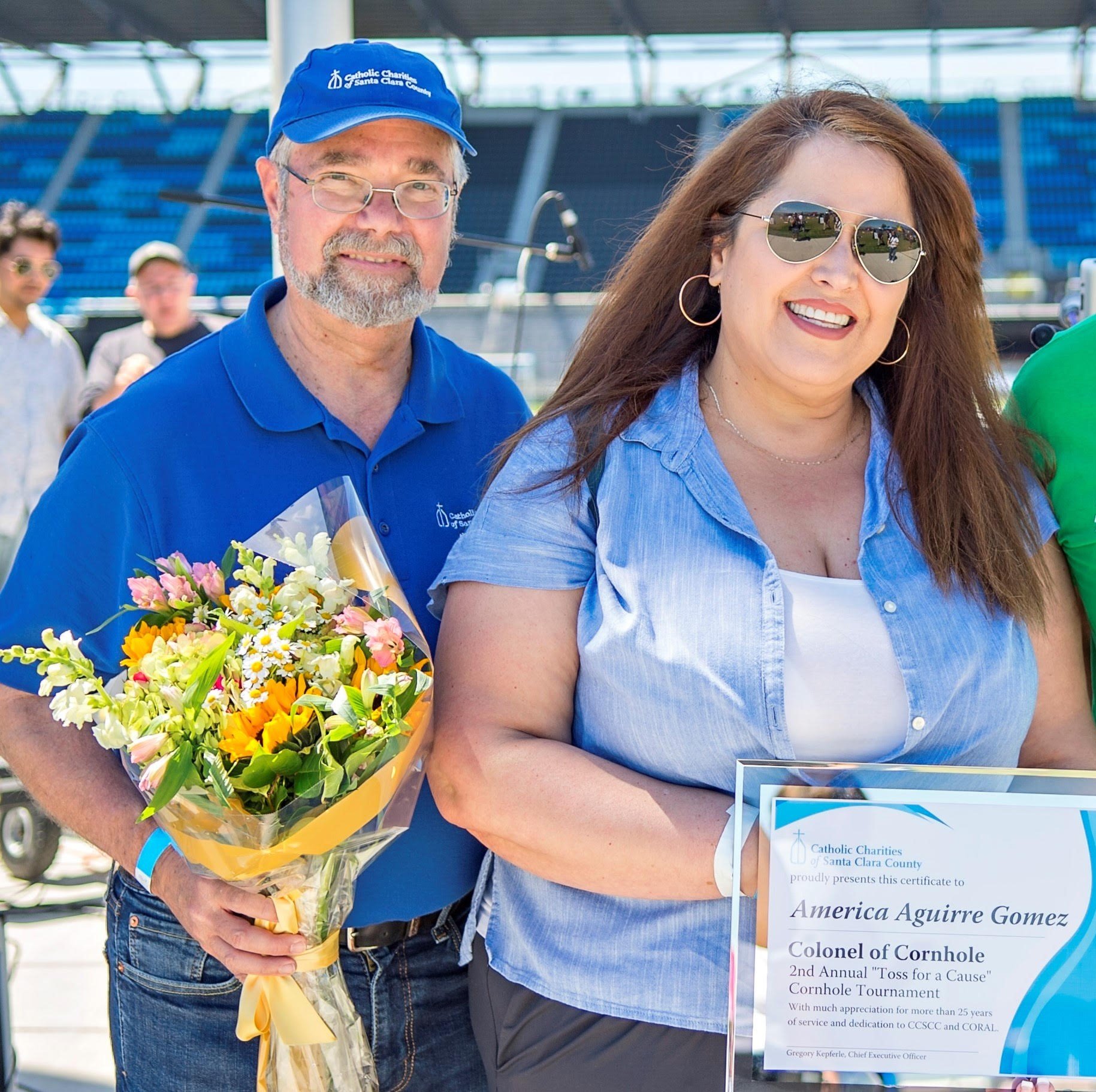   América is pictured with CCSCC CEO Greg Kepferle at the 2nd Annual Cornhole Tournament held on April 22 at PayPal Park.  