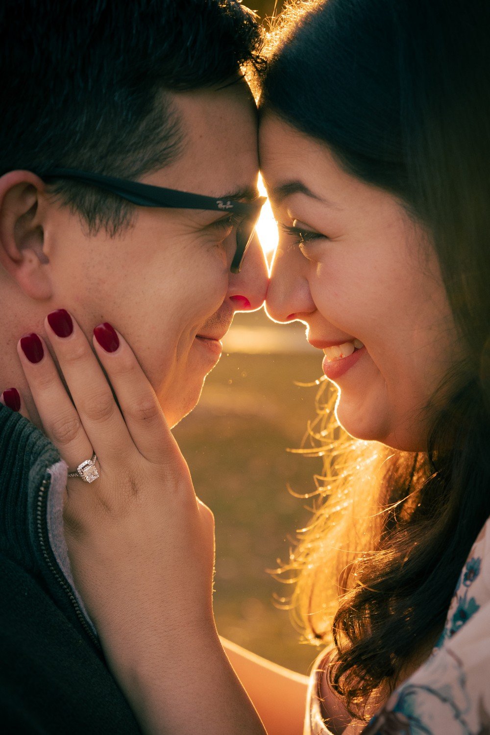 a couple at Sterne Park in Littleton just after their proposal.jpg