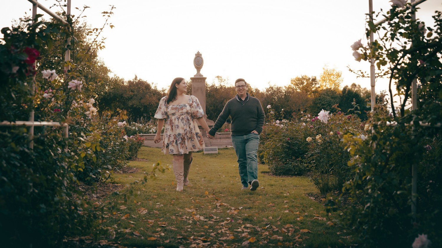 a couple walking together in sterne park right after their engagement.jpg