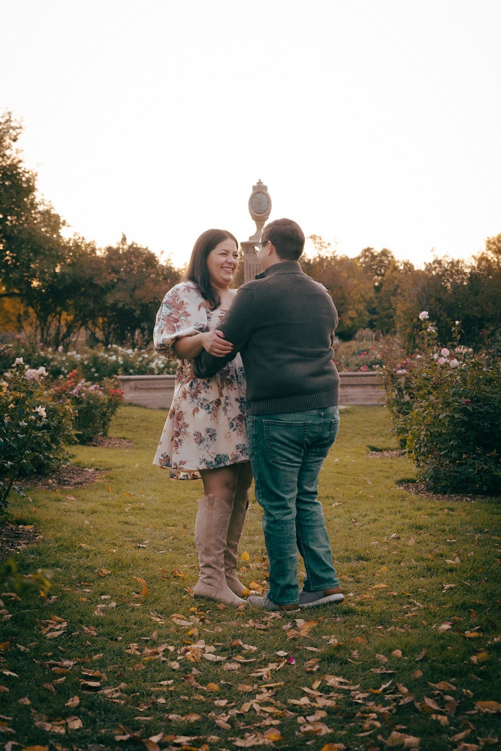 a cute couple together in a rose garden in littleton.jpg