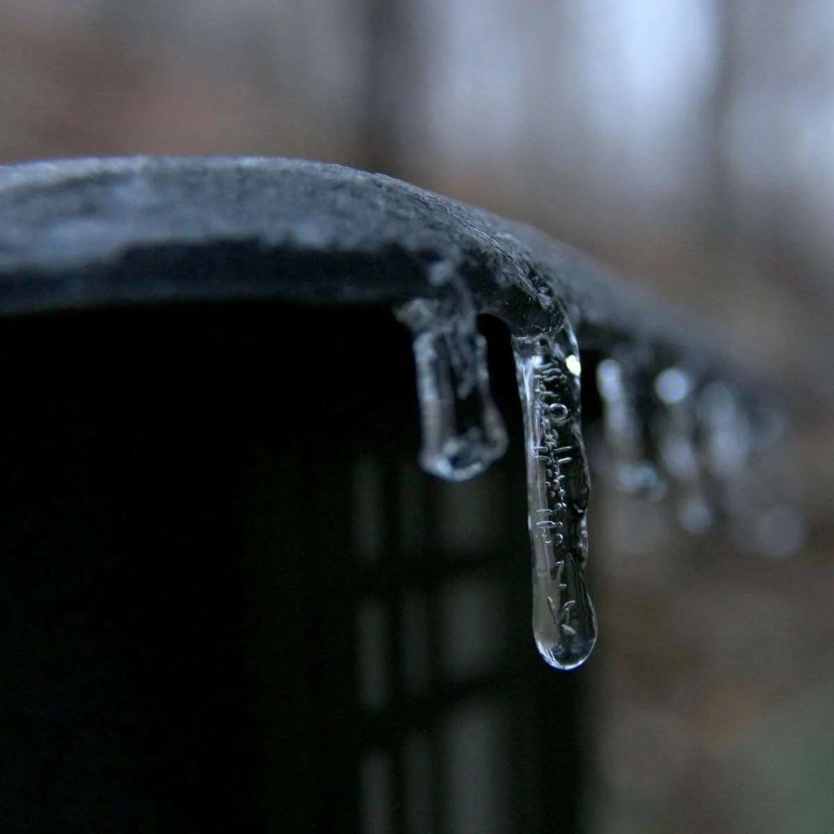 ice hanging from a cold plunge pool