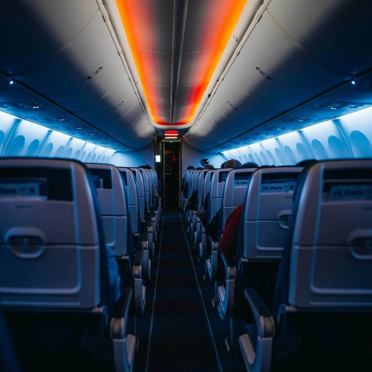 a dark commercial airplane cabin