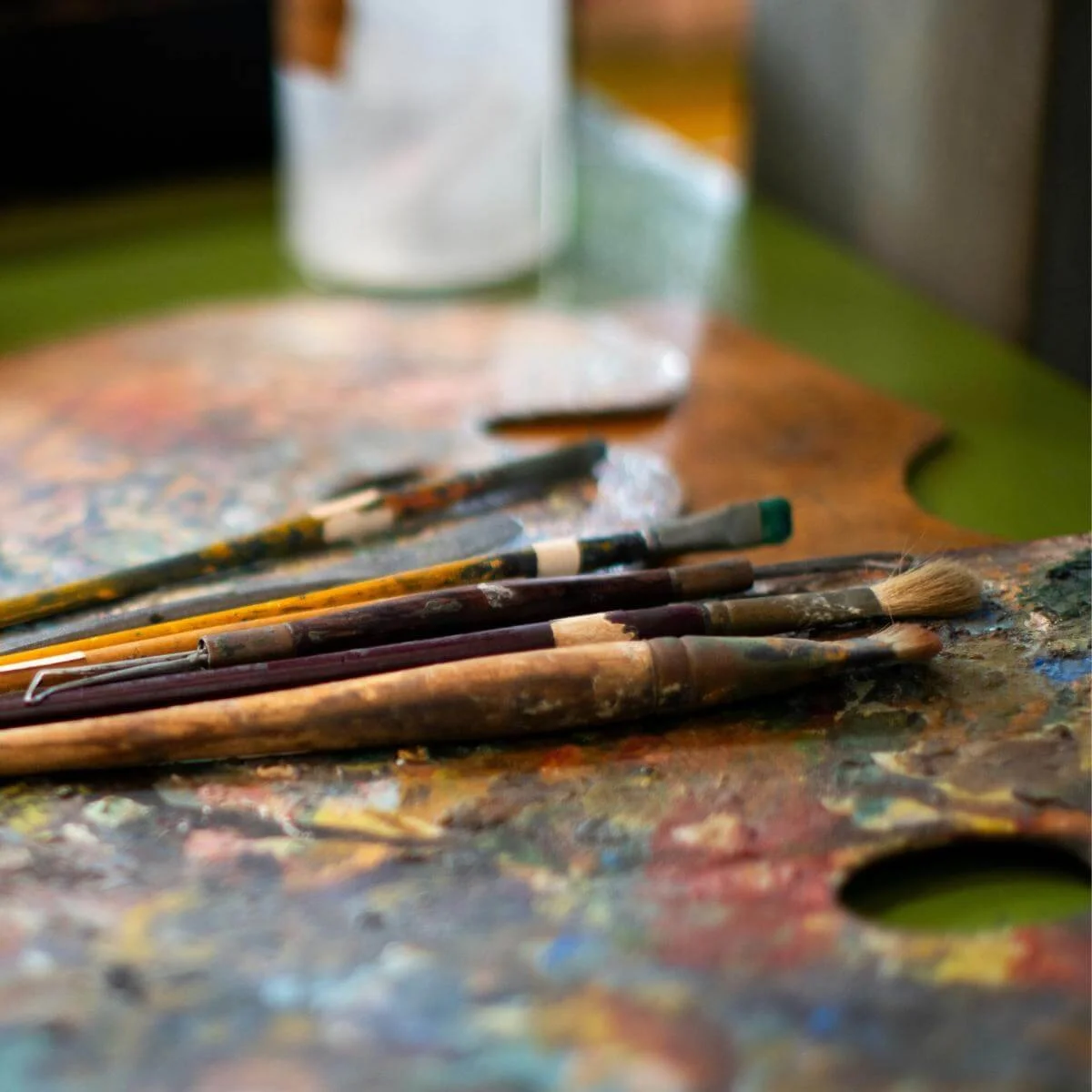 paint brushes and a palette