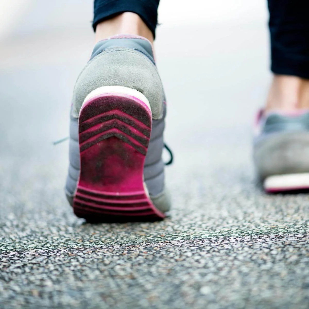 a shot of a woman's feet and shoes walking