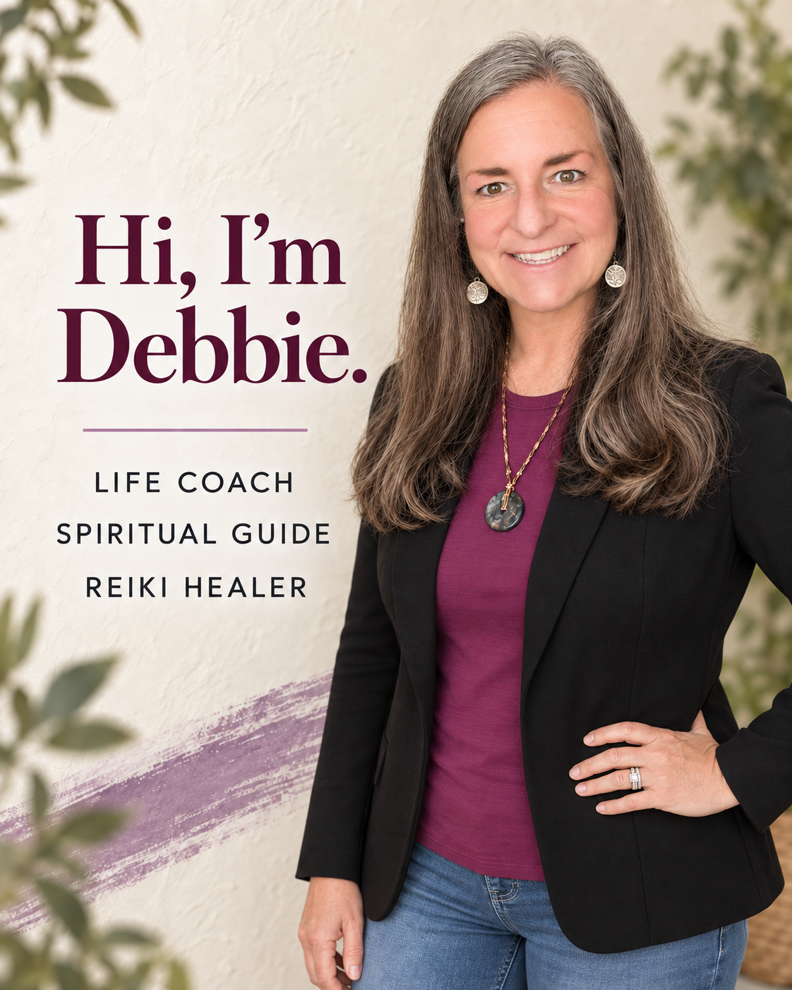 Photo of Debbie, smiling, wearing a black blazer over a purple top, standing next to a sign that reads 'Hi, I'm Debbie. Life Coach, Spiritual Guide, Reiki Healer.'