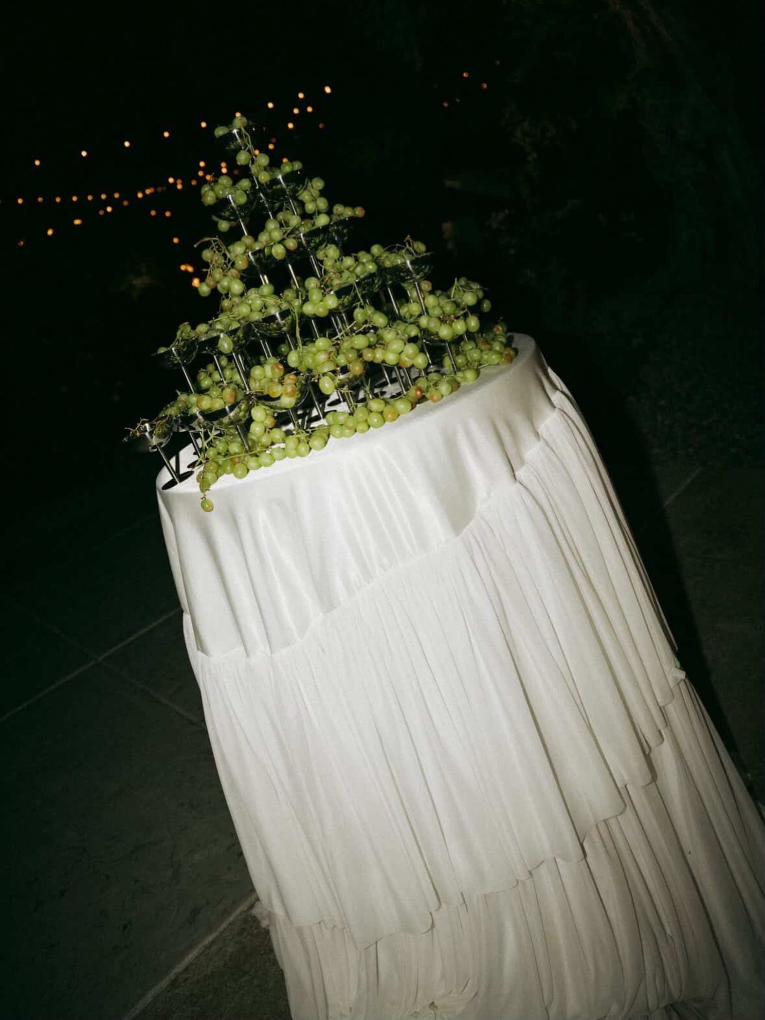 Some linens don&rsquo;t just dress a table, they become the moment.

Our custom tiered pearl tablecloth paired with a cascading champagne tower + fresh grapes created the dreamiest statement table. Romantic, elevated, and designed to turn heads from 