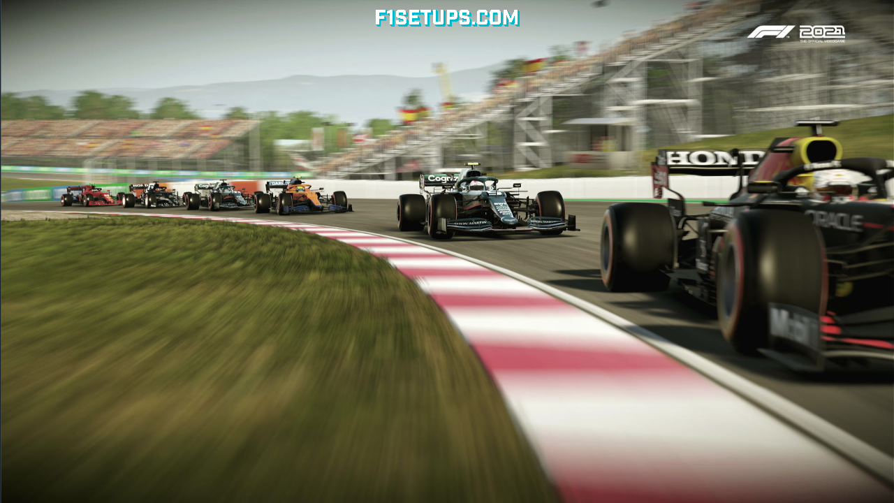 A group of F1 cards on the start/finish straight at the Singapore GP circuit. Shot in F1 2021 game. 