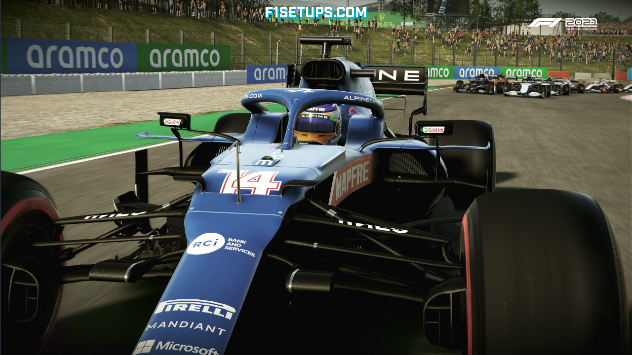 Sebastian Vettel's Aston Martin F1 car crossing the finish line at the Singapore Gp Circuit. Overhead shot from F1 2021 game.